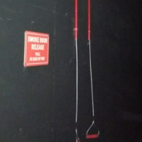 Smoke door vent hatch release